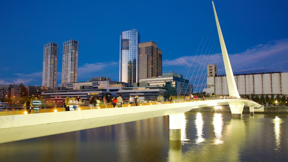Puerto Madero which includes night scenes, a bridge and a river or creek