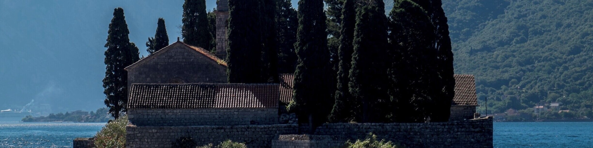 The Island of Saint George (Sveti Đorđe) is a natural islet off the coast of Perast in the Bay of Kotor, Montenegro. The island contains Saint George Benedictine monastery from the 12th century and the old graveyard.