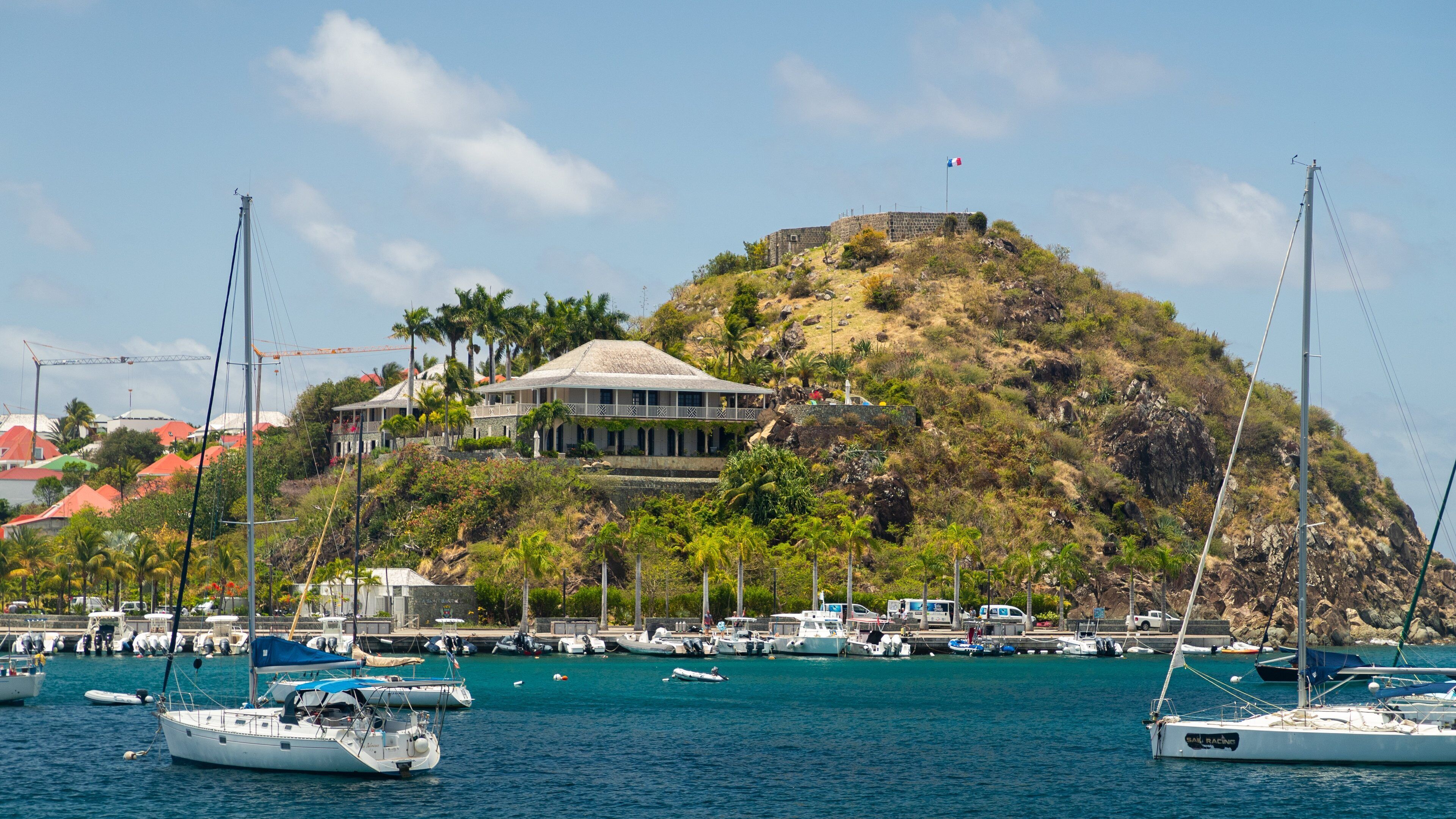 St. Barthelemy showing a bay or harbor, general coastal views and a coastal town