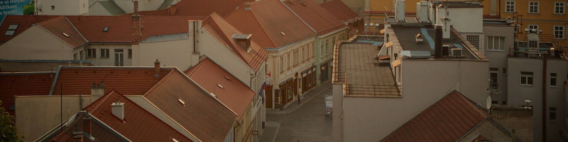 Trencin which includes a city and a sunset