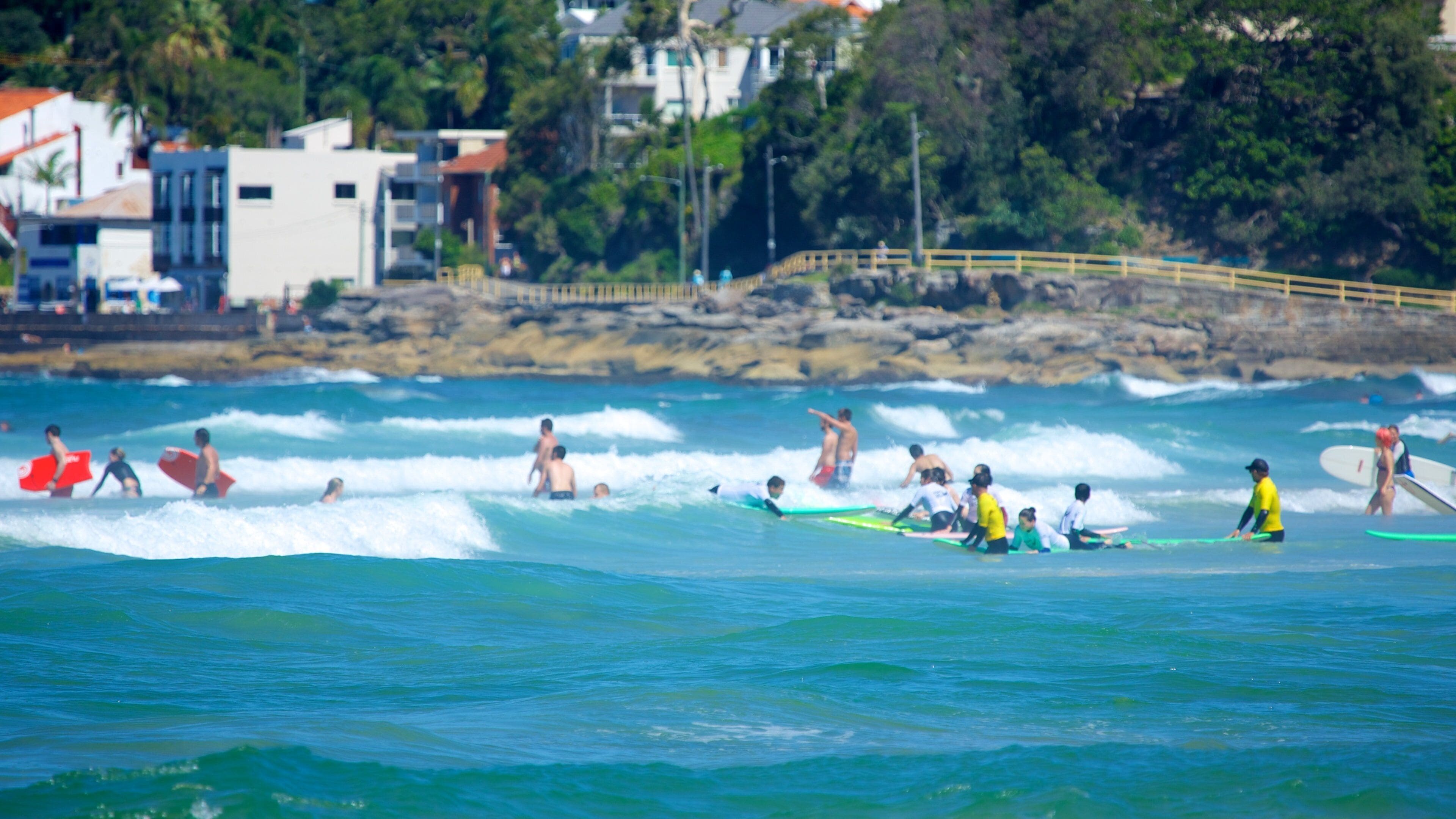 Manly Beach showing a coastal town, general coastal views and surfing