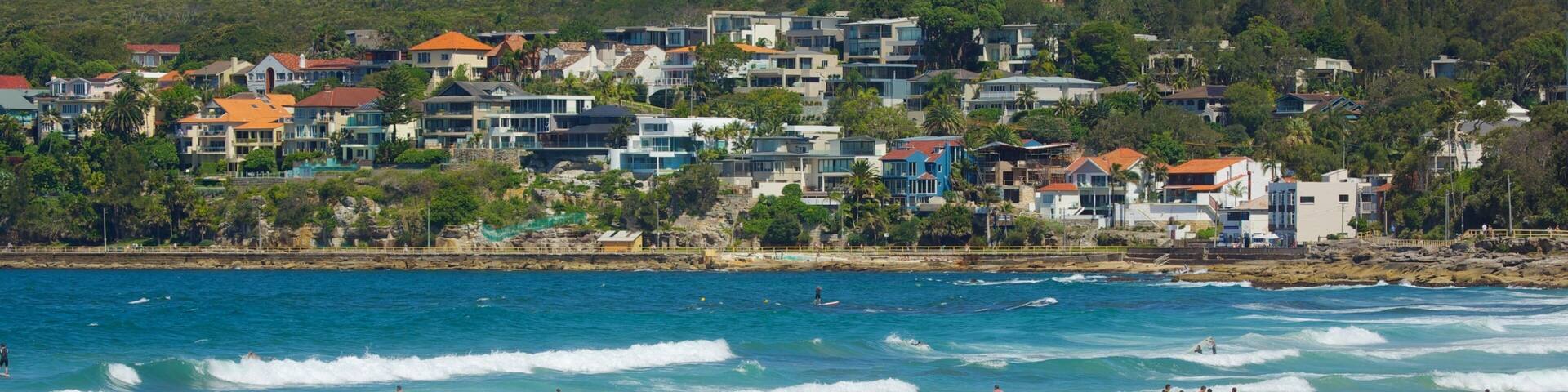 Manly Beach featuring a coastal town, swimming and a sandy beach
