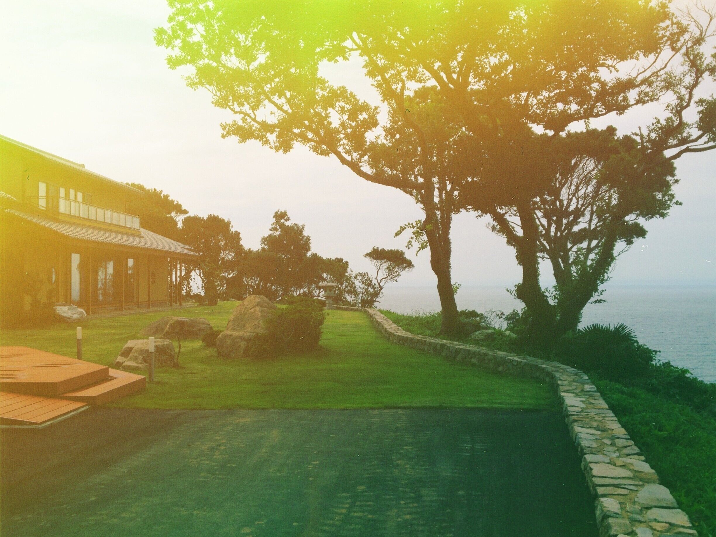 The back of Cafe Earth in Fukui Japan. It is surrounded by a beautiful garden and is on a cliff overlooking the sea. You really can't that.

Cafe Website: http://www.earth-cafe.org/