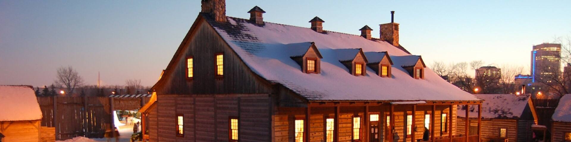 Winnipeg mostrando neve e uma cidade pequena ou vila