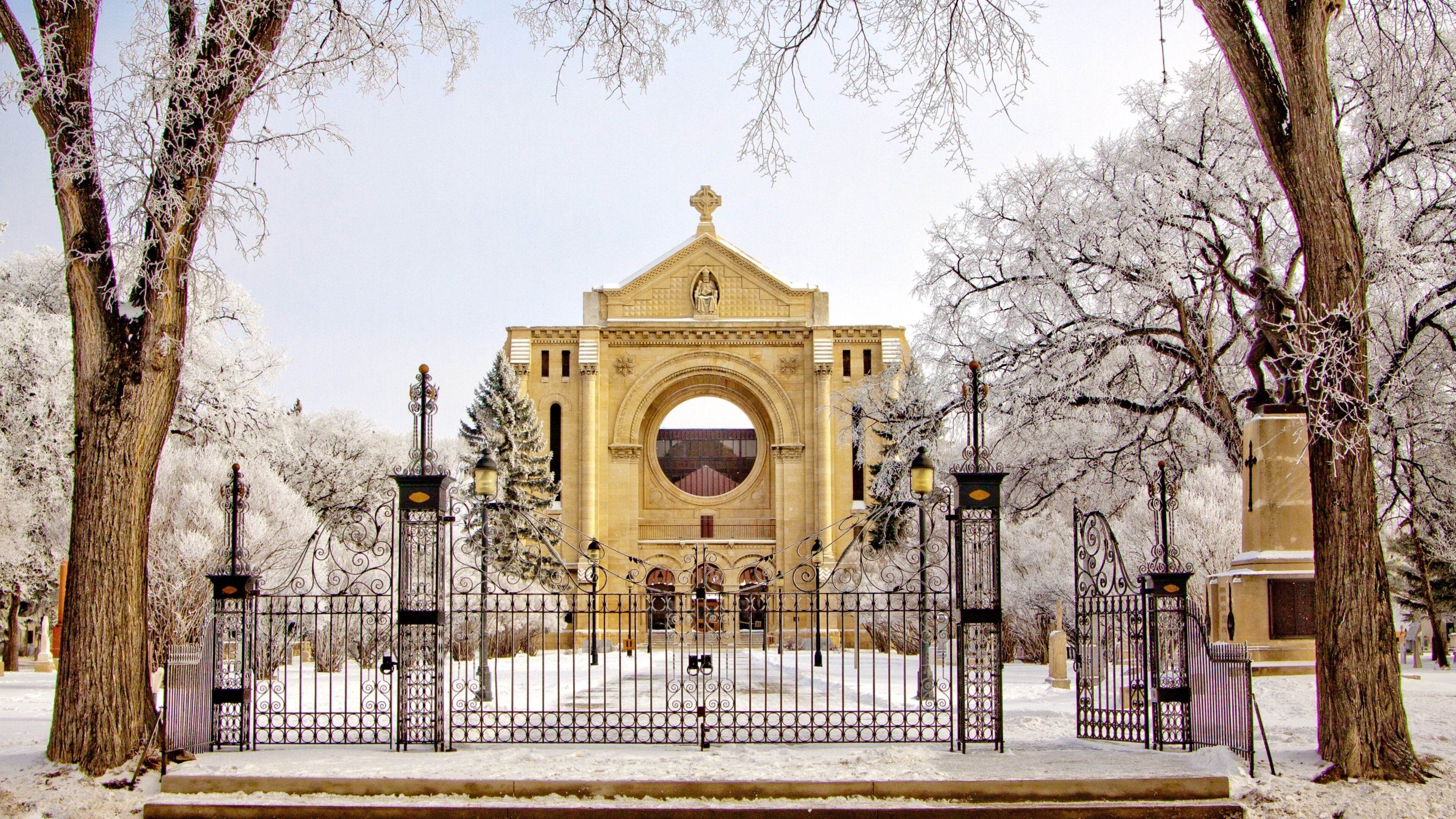 Winnipeg featuring snow, heritage architecture and a church or cathedral