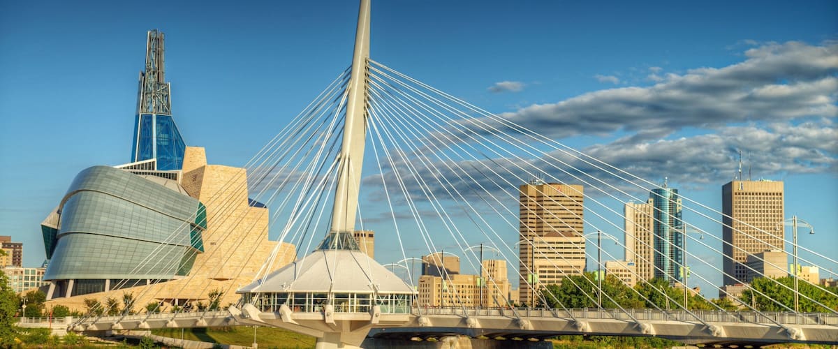Winnipeg which includes a city, modern architecture and a bridge