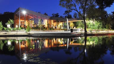 Winnipeg which includes a lake or waterhole, modern architecture and night scenes