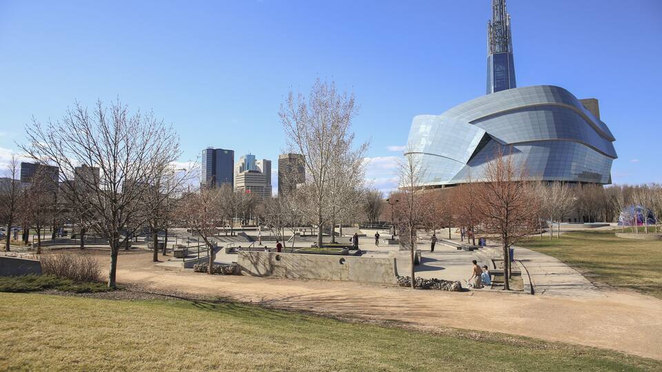 Winnipeg, Manitoba / Canada - April 22, 2019: Sports Parks with the Canadian Museum for Human Rights in the Background.