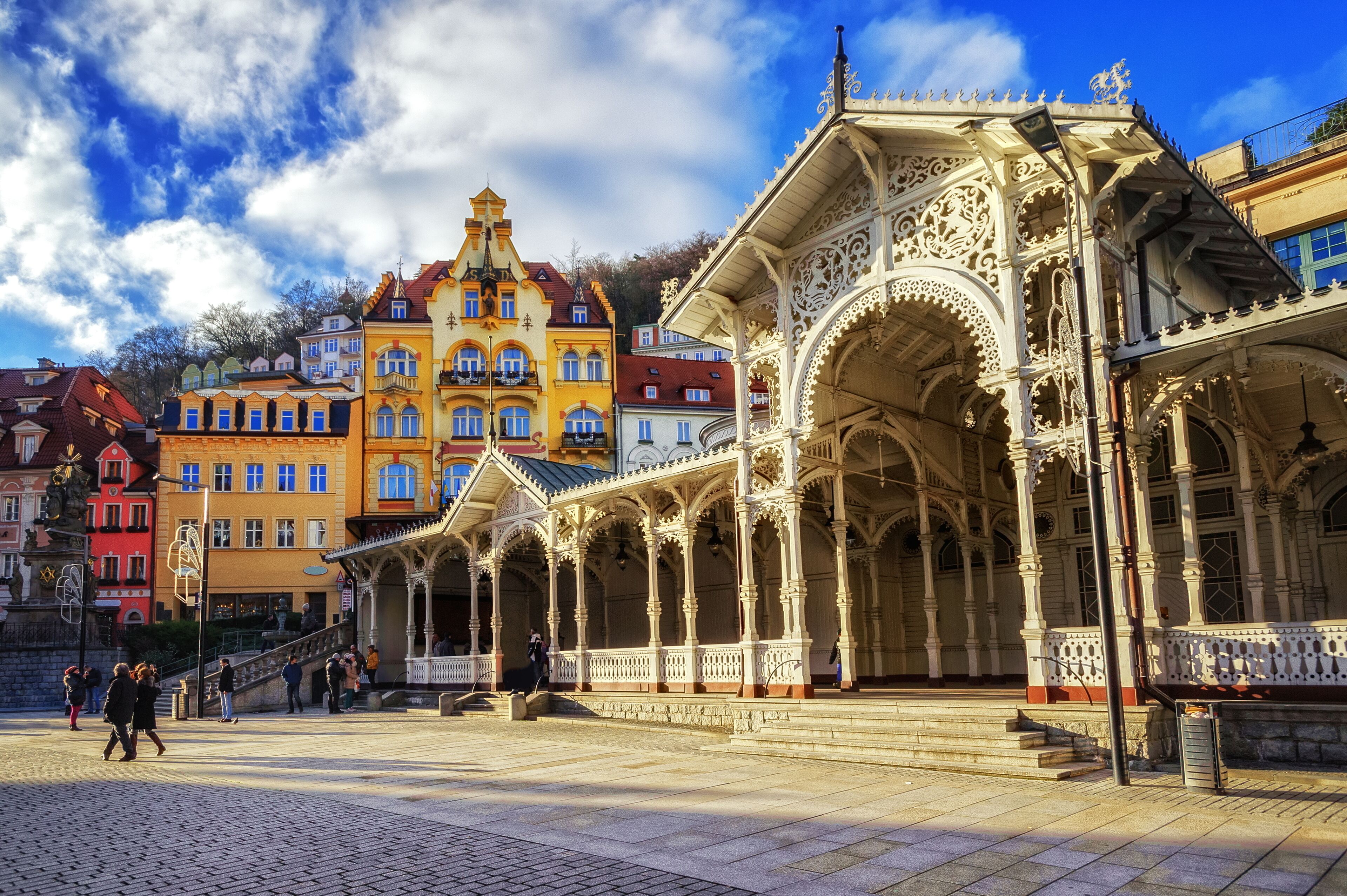 A historic building with ornate architecture and a vibrant, colorful backdrop.