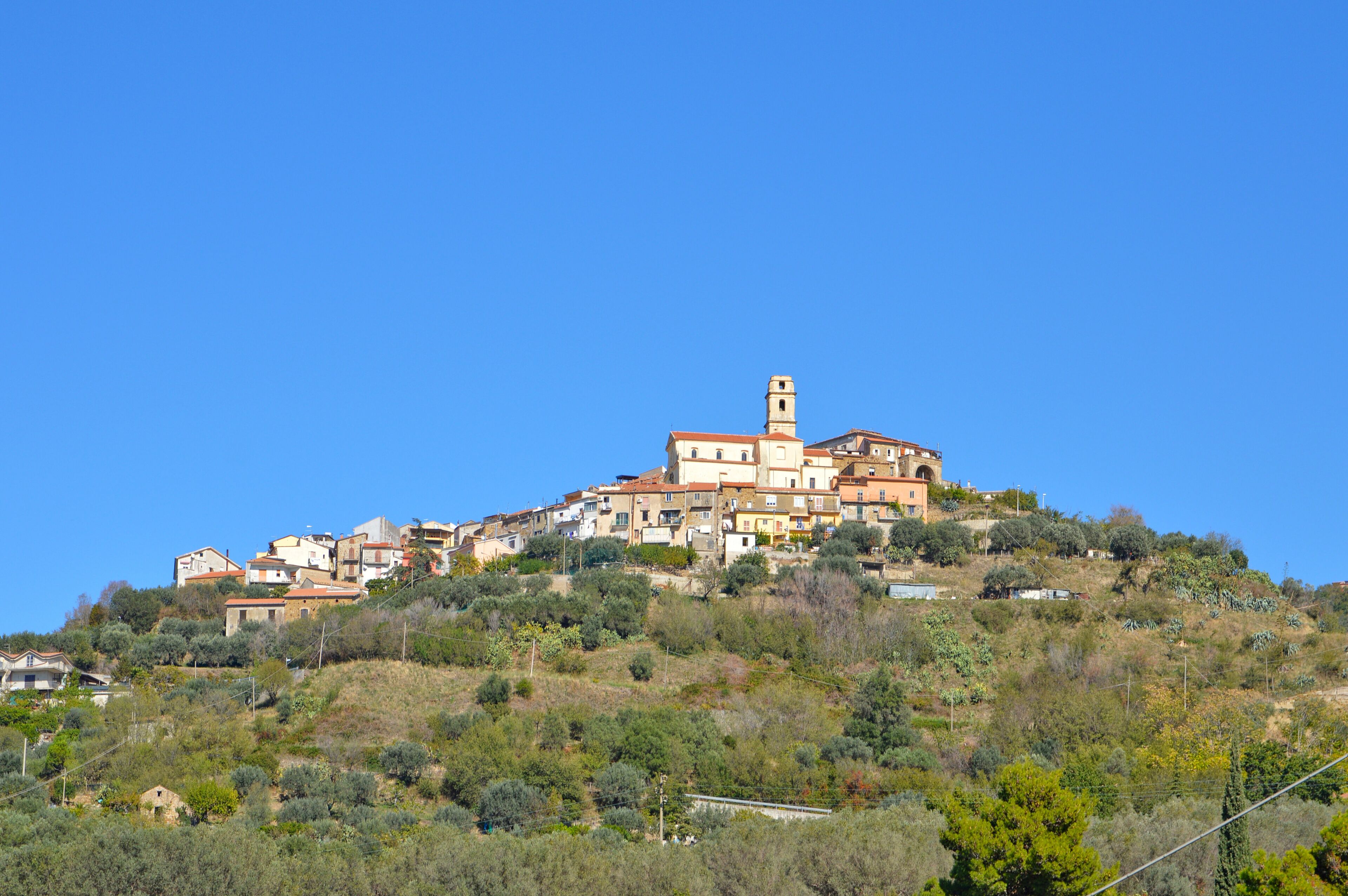 Province of Salerno, Italy, 10/21/2017. A narrow road between the old houses of a rural village.