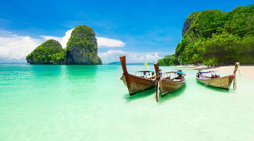 Beauty beach and limestone rocks, focus on the boats