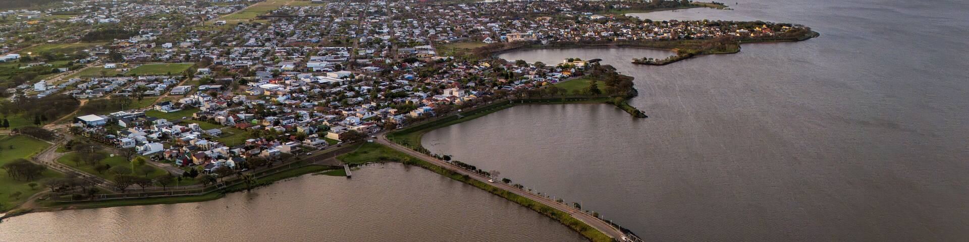 Aerial panoramic photo of the city of Federación in Entre Ríos province, Argentina, with the Uruguay River in view.