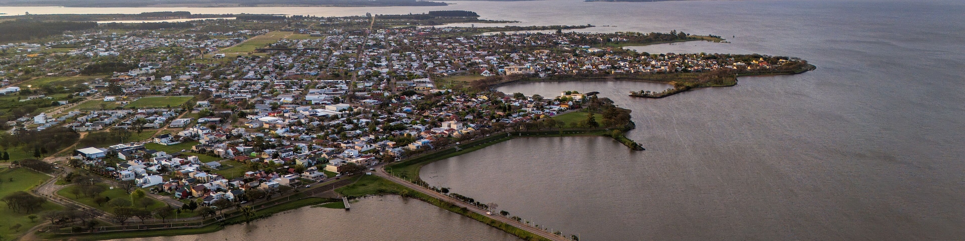 Aerial panoramic photo of the city of Federación in Entre Ríos province, Argentina, with the Uruguay River in view.