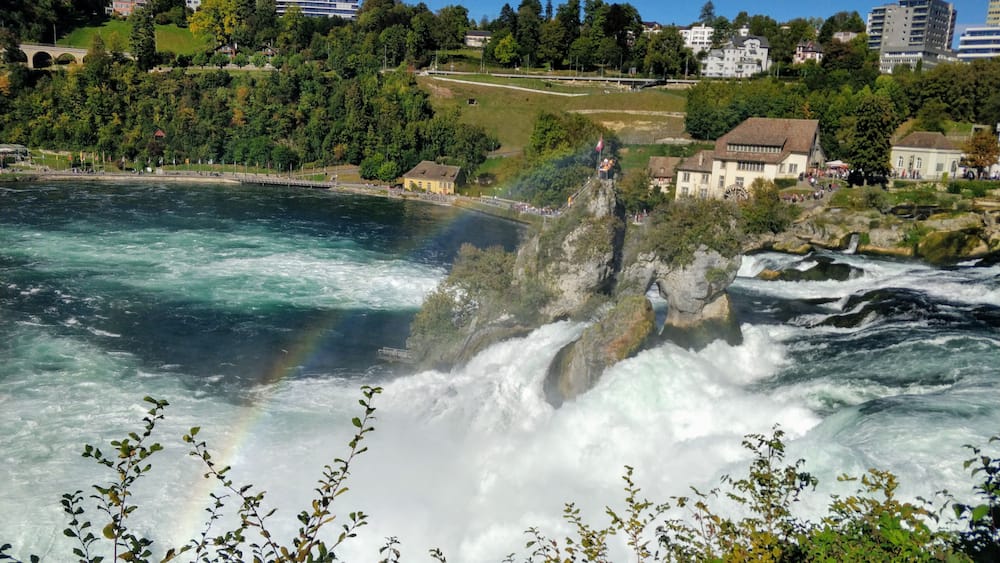 Also known as the most powerful water in the Europe, it truly is! #Trovember #rainbow #waterfall
