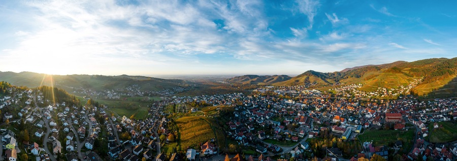 Colorful landscape aerial view of little village Kappelrodeck in Black Forest mountains. Beautiful medieval castle Burg Rodeck.