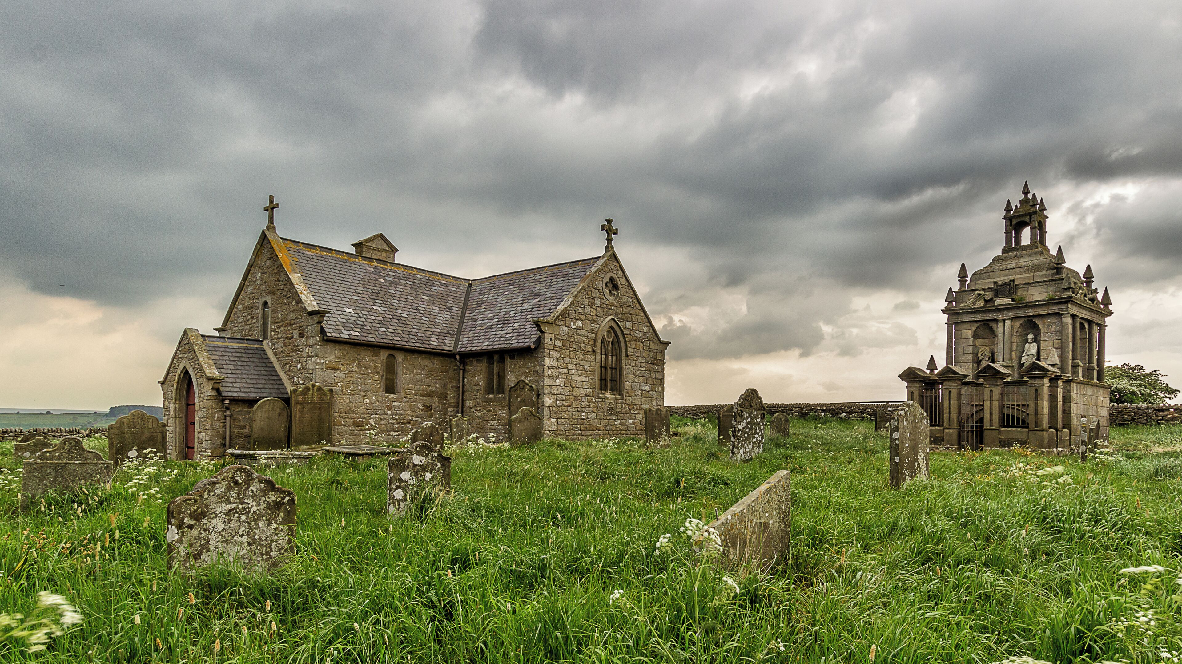 St Andrew's parish church, Shotley, Northumberland, seen from east-southeast, with the Hopper Mausoleum on the right