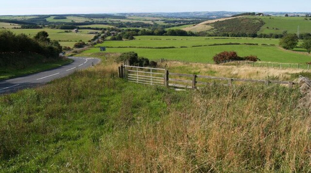 Farmland North of Whittonstall and B6309 Farmland North of Whittonstall Also showing the Roman road of Dere Street (B6309) stretching north towards the Tyne Valley in the far distance. The hamlet of Apperley Fell is visible to right hand side middle horizon.