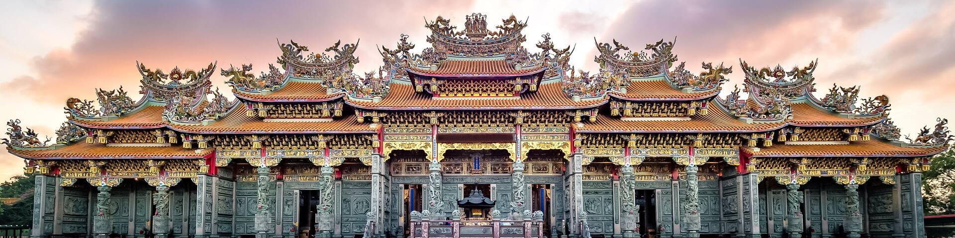 A traditional temple with ornate architecture and a large open courtyard.