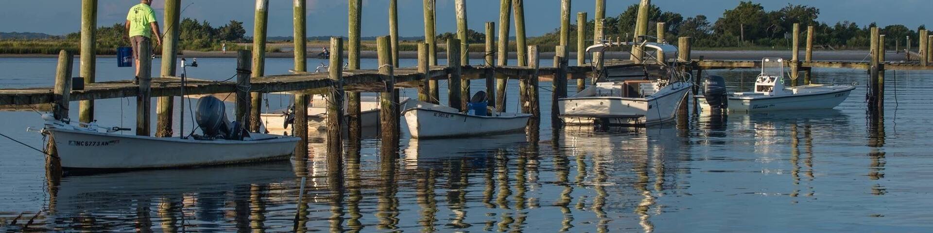 Pretty pier and boats early in the morning