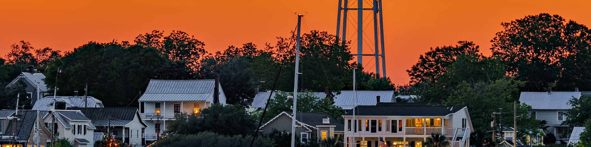 sunset on the waterfront of a city