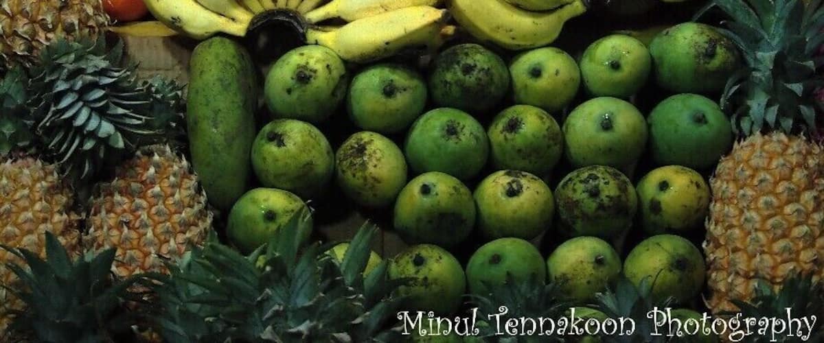 OLYMPUS E-PM1
Exposure Time: 1/50 sec
ISO-800
Focal Length: 40 mm
A fruit stall near the Katharagama Maha Devalaya. There are many shops in this area as people buy loads of fruit baskets in order to observe them to the gods in the kovil.