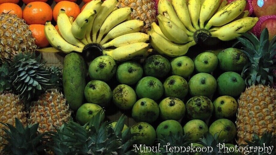 OLYMPUS E-PM1
Exposure Time: 1/50 sec
ISO-800
Focal Length: 40 mm
A fruit stall near the Katharagama Maha Devalaya. There are many shops in this area as people buy loads of fruit baskets in order to observe them to the gods in the kovil.