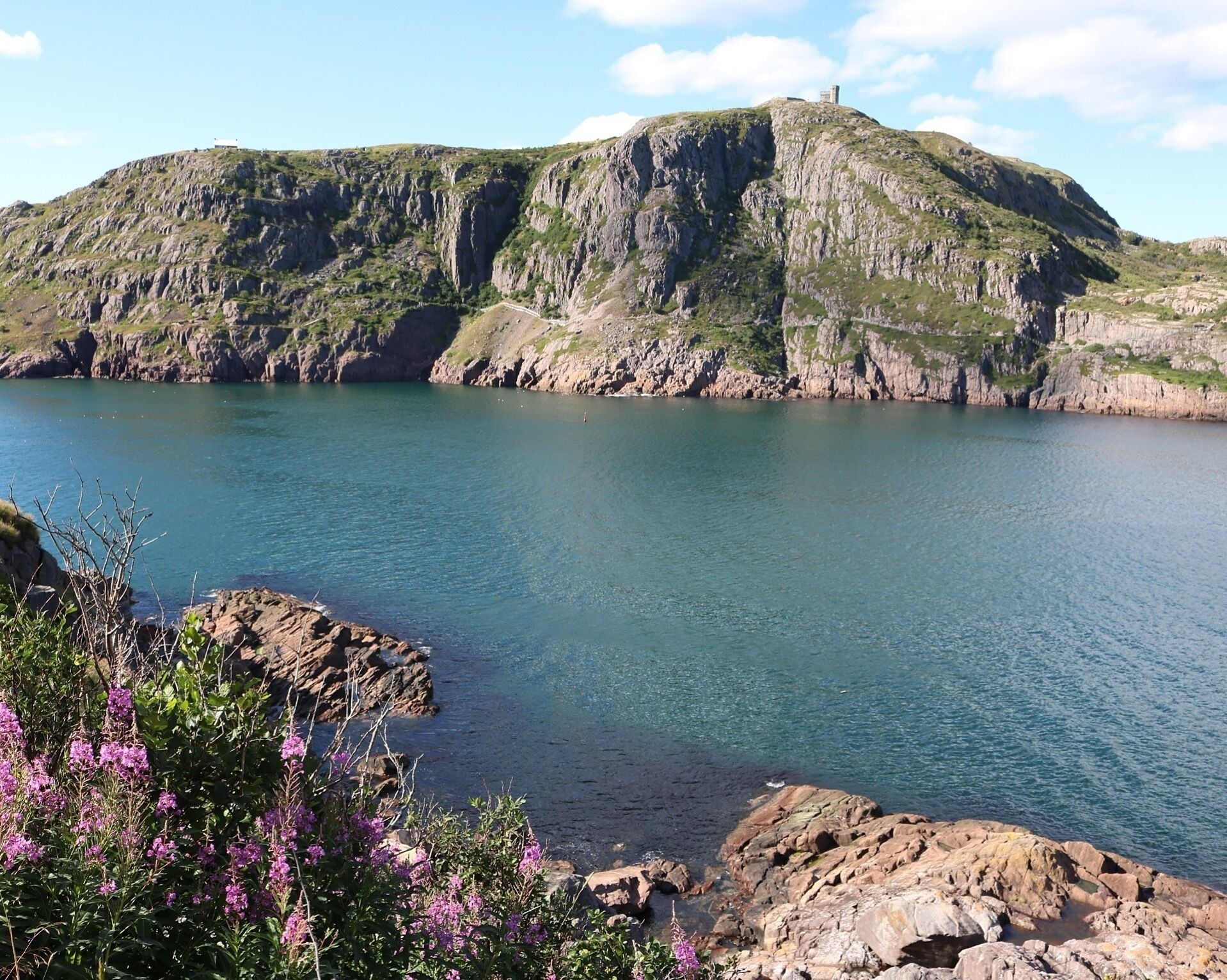 "She's a rocky isle in the ocean and she's pounded by winds from the sea; you might think that she's rugged and cold but she's home sweet home to me." St. John's is my saltwater joy. #LoveMyTown