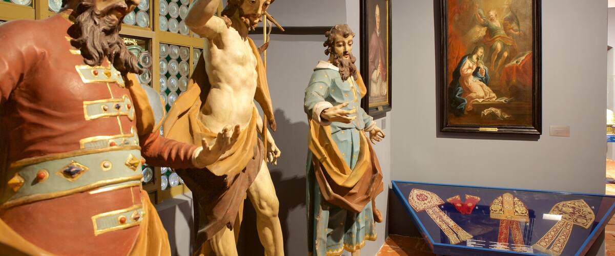 Catholic Bishop\'s Palace Museum featuring interior views and a statue or sculpture