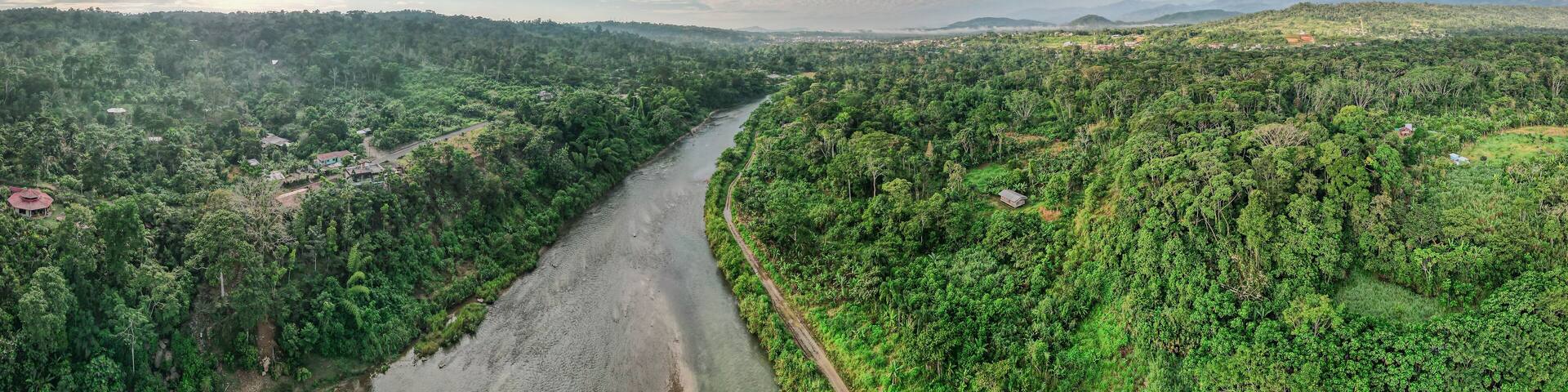 Aerial view of the river and the Amazona Rainforest in Tena, Ecuador