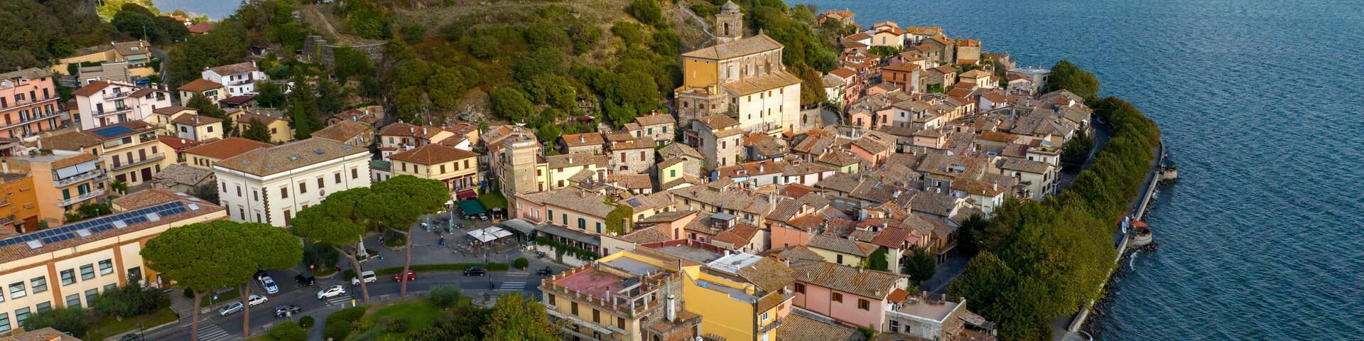 Aerial view of the historic center of Trevignano Romano. It is a small town in the metropolitan city of Rome, Lazio, Italy. It is located on the volcanic Lake Bracciano.