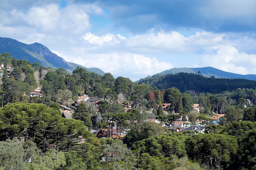 view of nature and buildings among the mountains of Monte Verde, district of Camanducaia, interior of Minas Gerais