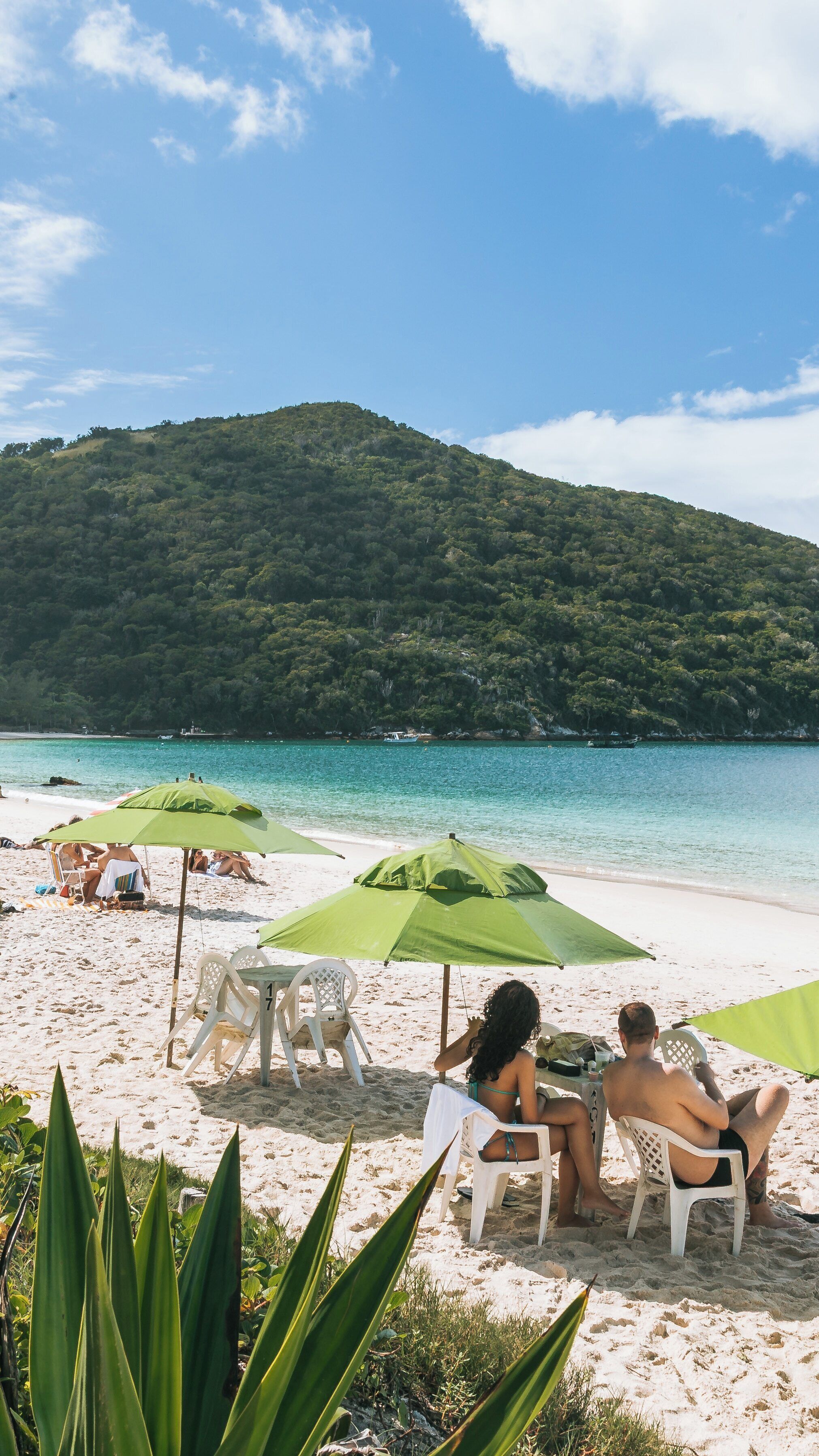 Relaxing day at Forno Beach with clear skies and stunning views in Arraial do Cabo, Rio de Janeiro State, Brazil