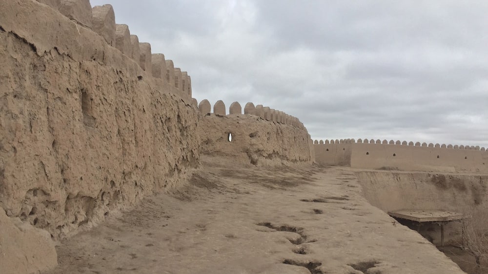 Climb up the steps near the north gate and walk on the old city walls for a bit. Watch out for the softer areas.