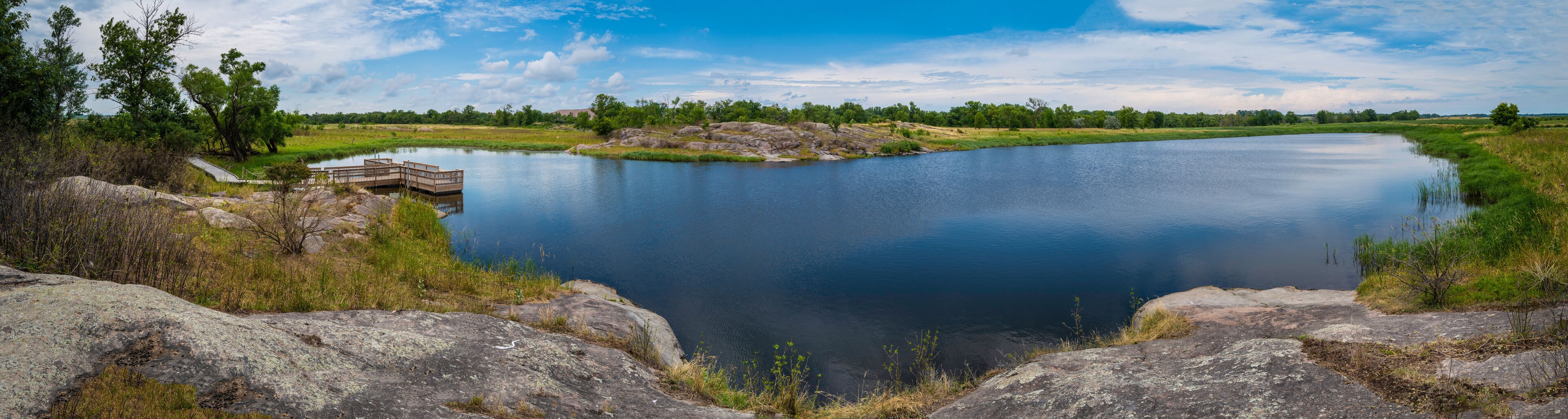Peaceful wildlife animal sanctuary and glacial rock pond landscape at Big Stone National Wildlife Refuge in Minnesota River, Odessa, Minnesota
