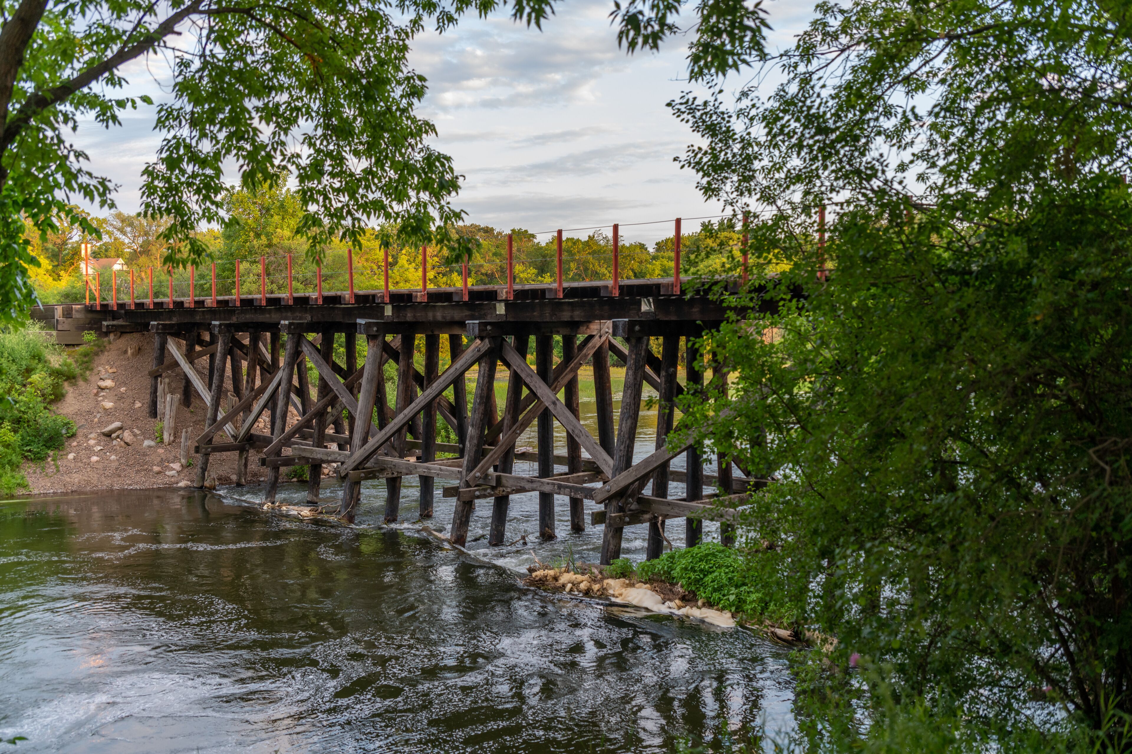 Wooden railroad bridge over the Otter Tail River in Fergus Falls, Minnesota.
