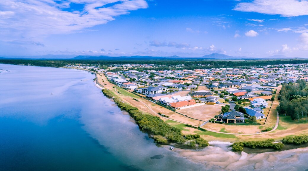 Aerial panorama of scenic coastal village in New South Wales, Australia