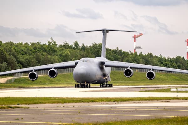 American military airf orce transport aircraft departing an air base.