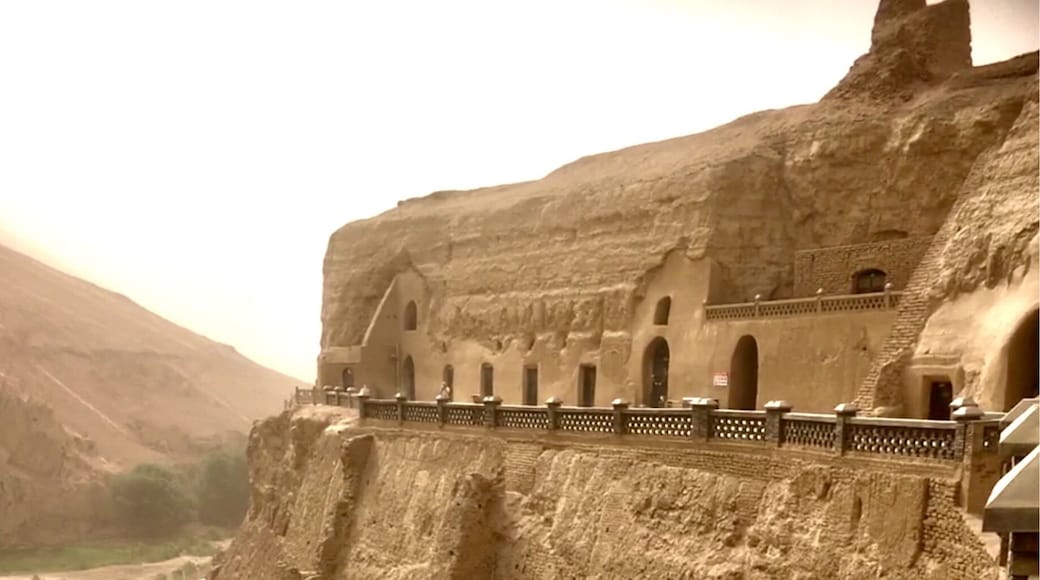 This is the 1000 Buddha caves outside of Turpan, China. It was windy today and a dust sty was blowing up in the area.