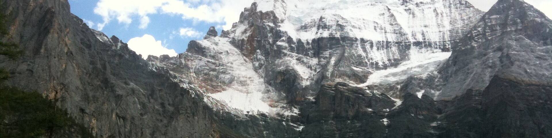 Xian Nai Ri
6000+ meters
Located in the Yading Natural Reserve in Daocheng, China.
Known as the Three Holy Mountain.
Photo from August 2011