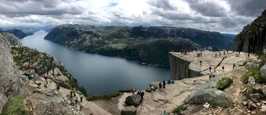 Pano from as high as we could get... couldn't figure out how to get higher despite seeing people above us. Didn't seem safe/worth it... but still high enough to get the rock and fjord... stunning!!