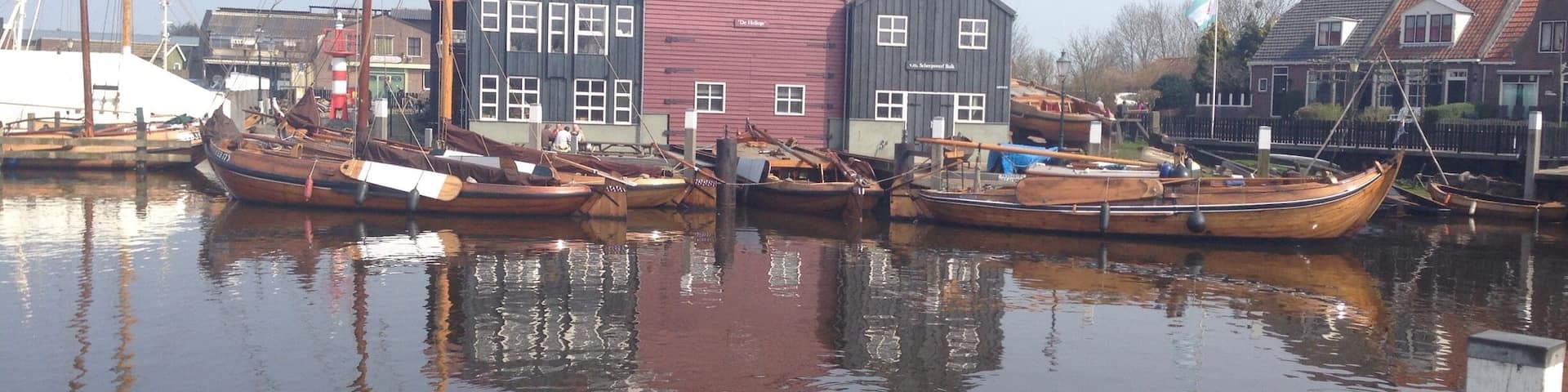 This former wharf is just a prelude of what's to come when you enter the old town of Elburg. The wharf is a museum now, which aims to preserve the traditional "botter" ships, as seen in the harbour. Very impressive to see them in a "botter race"! http://www.botterselburg.nl/index.html