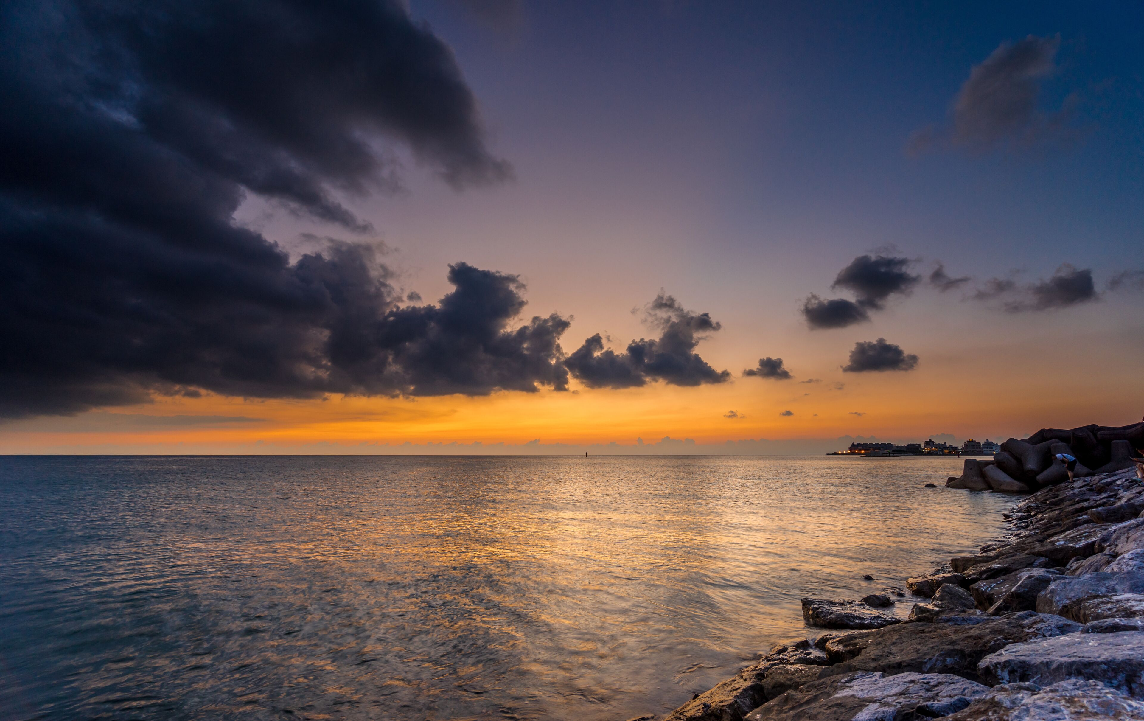 Colorufl nightfall cloudy waterscape in Sunset Beach, Chatan Okinawa, Japan