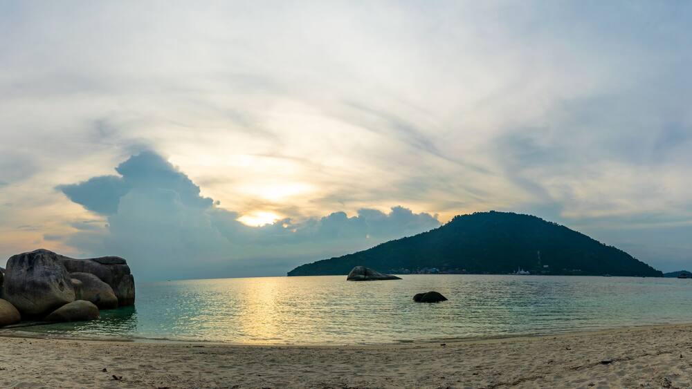 Besar, Perhentian Island, Malaysia; 18-May-2019; a panoramic view of Perhentian Kecil from Perhentian Besur at sunset, Perhentian Islands, Malaysia