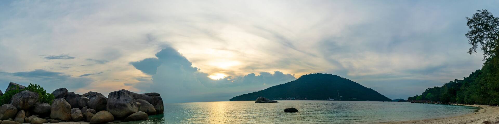 Besar, Perhentian Island, Malaysia; 18-May-2019; a panoramic view of Perhentian Kecil from Perhentian Besur at sunset, Perhentian Islands, Malaysia