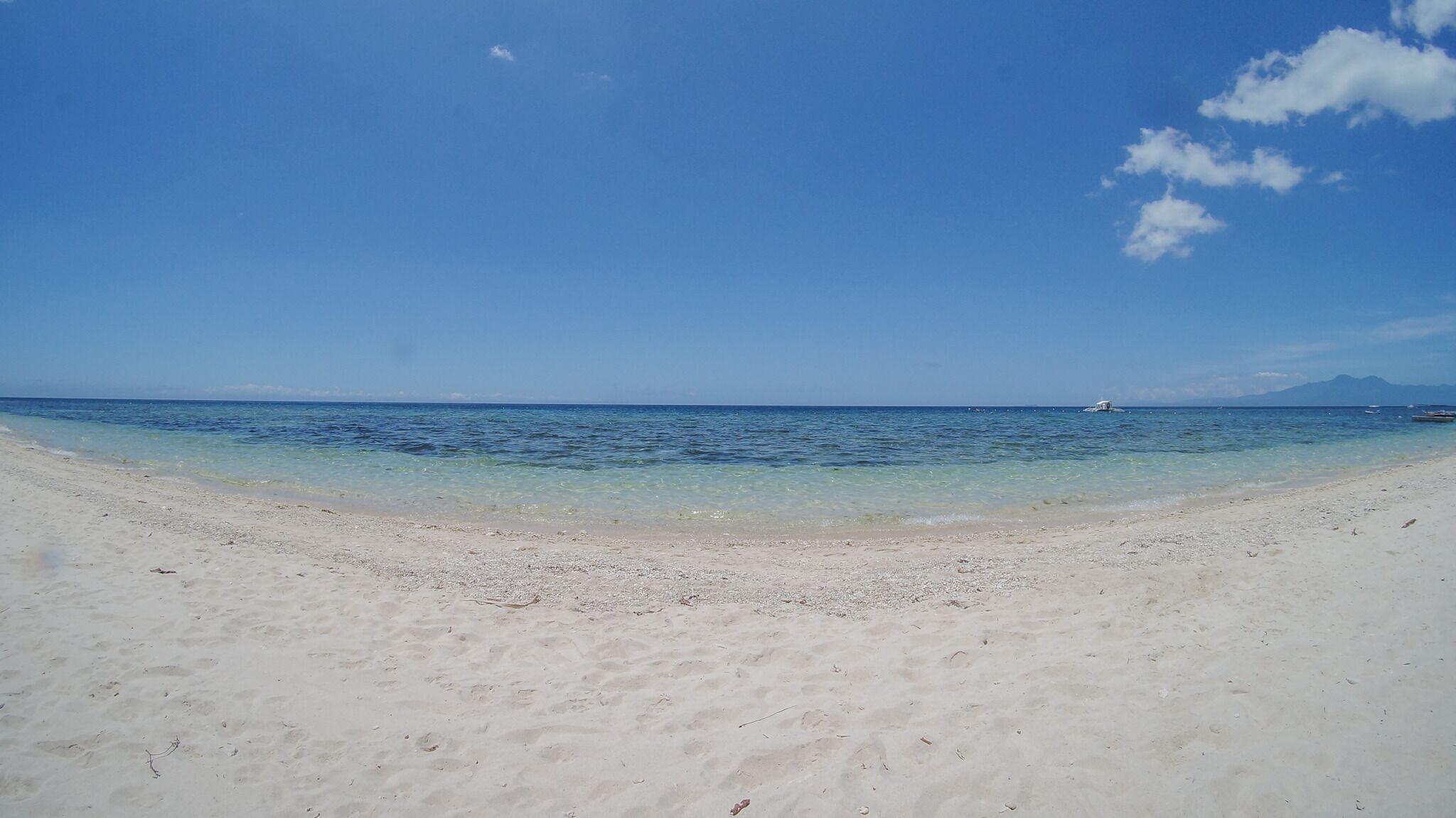 View from Tubod Beach at Coco Grove.  Can see Dumaguete in the distance (Right Side)

#tubodbeach #siquijor #whitesand
#cocogrove