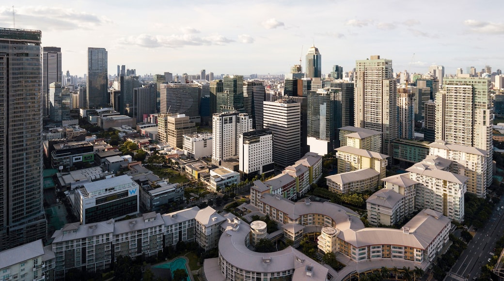 Fort Bonifacio, Metro Manila, Philippines - Aerial of Bonifacio High Street and Serendra, flanked by taller skyscrapers on each side. Beautiful urban zoning.