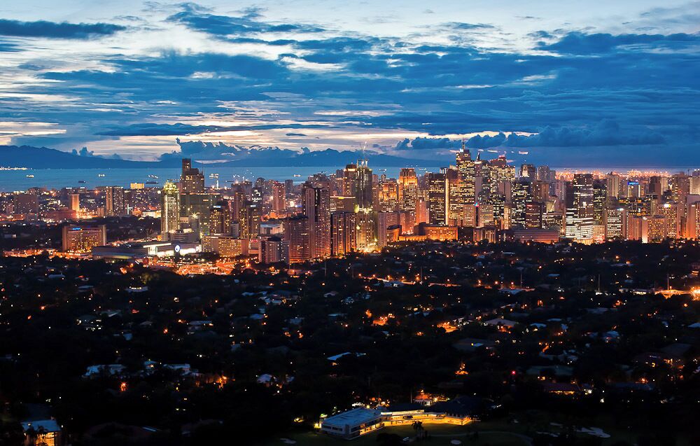 Manila.

When many think about Manila, the phrase "Pearl of the Orient" isn't what comes to mind. But before WW2 it was just that.

And this being my 10th year living here between a span of 1996 - 2015, I am convinced more than ever, that truly she is that.

Sometimes beauty is right there in front of you. And sometimes beauty is something that must be searched out.

As the saying goes, beauty is in the eye of the beholder. And I love Manila...all her good, bad and ugly. :)

(photo taken atop the 50+ floor of a highrise in Taguig looking towards Manila Bay at sunset...a beauty, I tell ya)