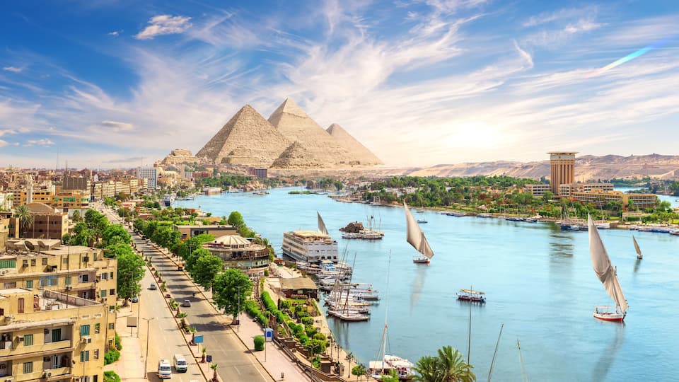 Aswan downtown with sailboats, panoramic view on the Nile, Egypt