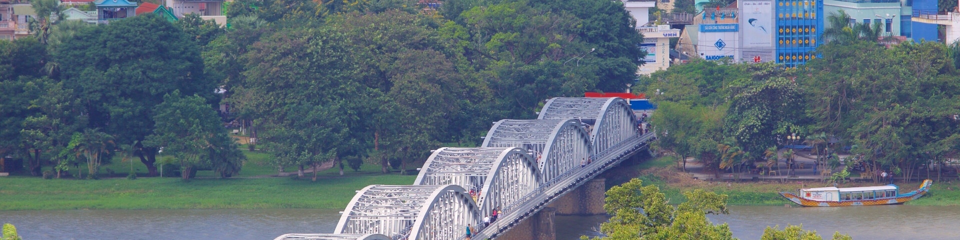 Hue showing a river or creek, a city and a bridge