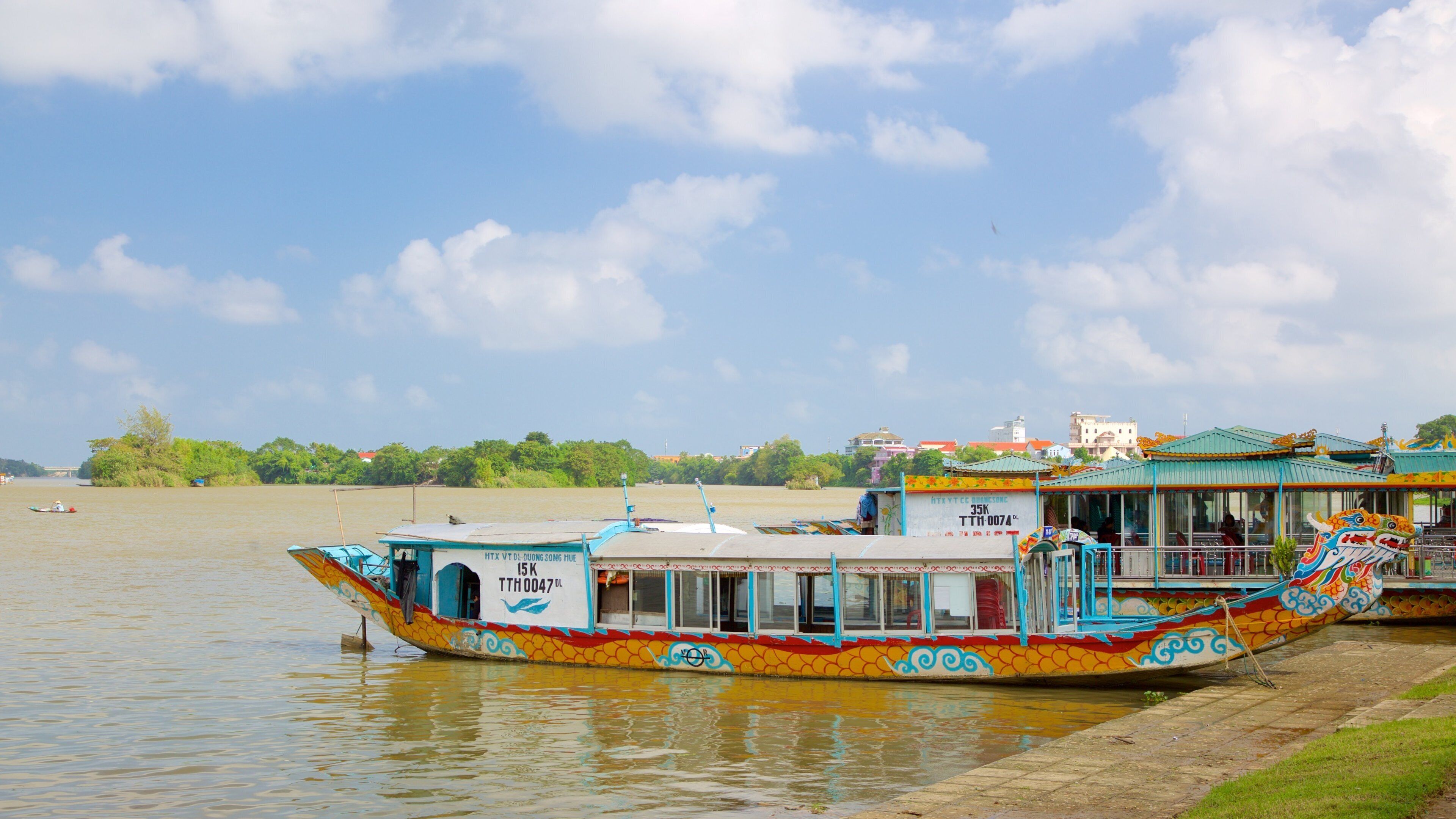 Hue featuring boating and a river or creek